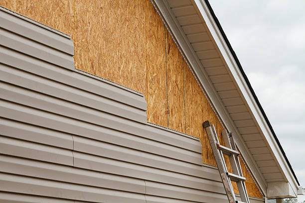 Professional Emergency Siding Repair technician working in Moshannon, PA